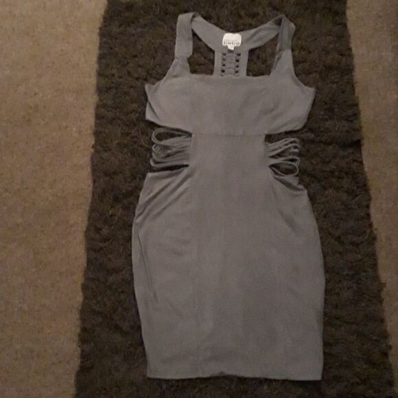 Bebe by Kardashian(inside stitch on bottom loose and 2 inches on right missing) - Picture 1 of 9